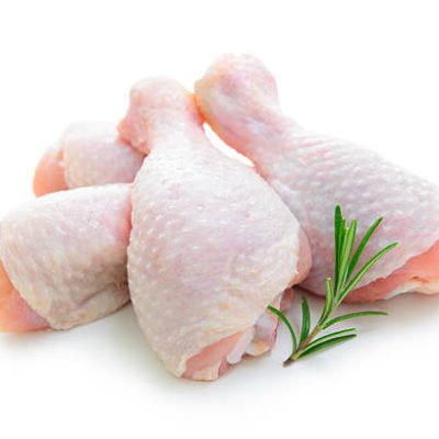Raw chicken legs on white background isolated